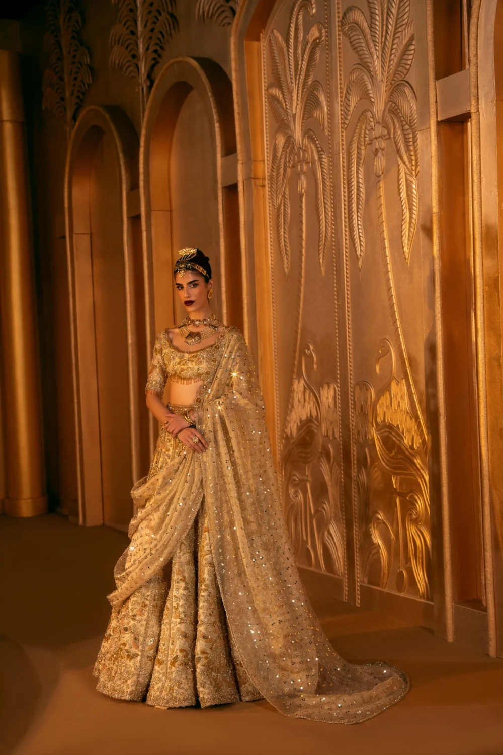ivory champagne gold wedding lehenga side profile net farshi silhouette Hammad Bespoke Official