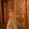 ivory champagne gold wedding lehenga side profile net farshi silhouette Hammad Bespoke Official