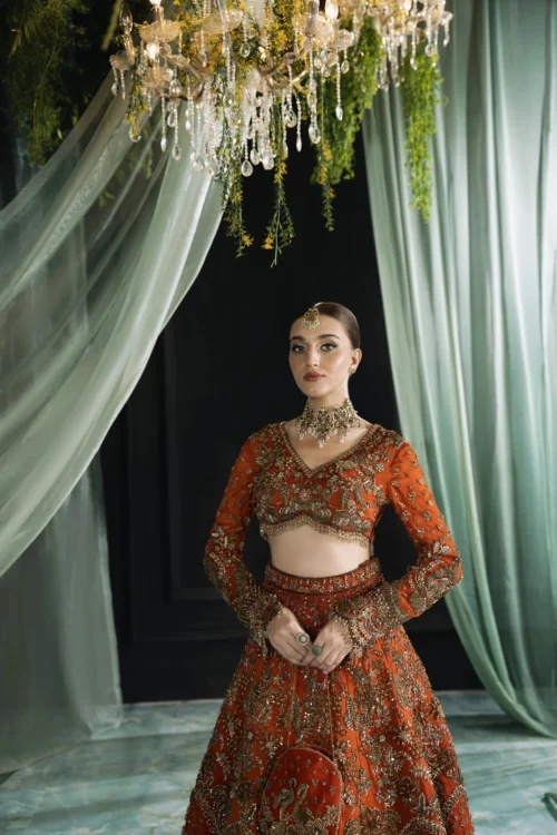 Bespoke orange organza bridal lehenga with antique gold Resham and crystal embellishment — Hammad Bespoke Official