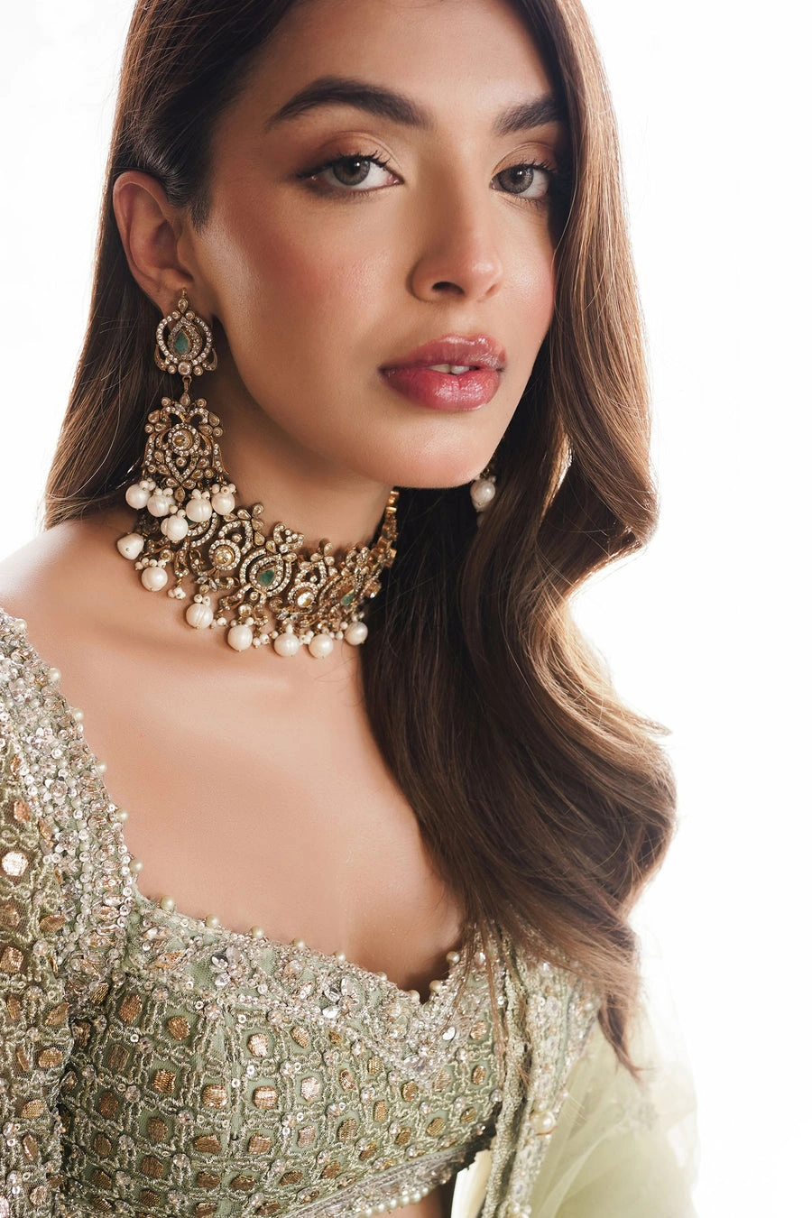 sage green lehenga bride close-up Zardozi encrusted bustier choli Gota pearl detail Hammad Bespoke Official