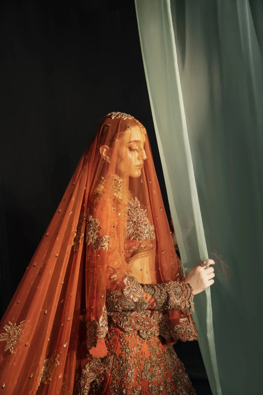 Burnt amber organza bridal lehenga with antique gold Dabka and Nakshi embroidery — Hammad Bespoke Official