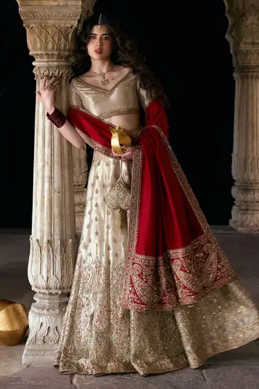 champagne-lehenga-for-wedding-red-raw-silk-shawl-tissue-farshi-hammad-bespoke-official.webp champagne lehenga for wedding red raw silk shawl tissue farshi Hammad Bespoke Official