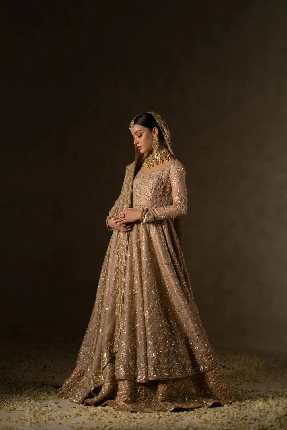 dusty-fawn-bridal-anarkali-sequin-lehenga-full-length-side-view-hammad-bespoke-official.webp fawn peshwas anarkali bridal dress gota embroidery nikkah Hammad Bespoke Official