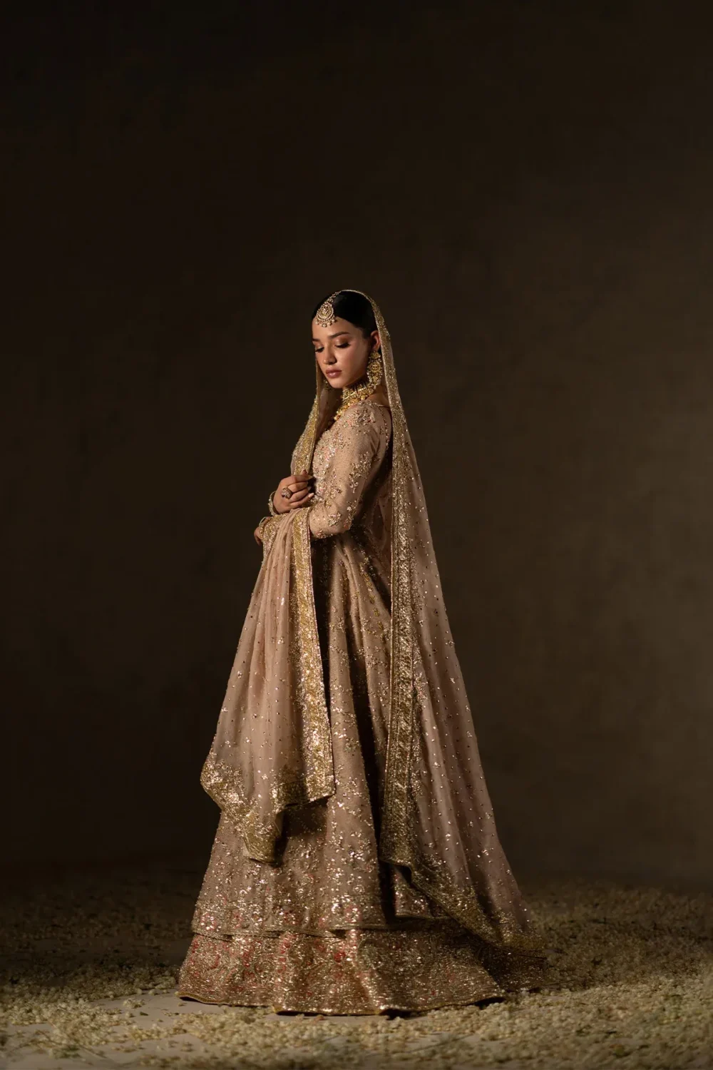 fawn-peshwas-anarkali-bridal-dress-gota-embroidery-nikkah-hammad-bespoke-official.webp dusty fawn bridal anarkali sequin lehenga full length side view Hammad Bespoke Official
