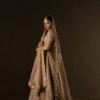 fawn-peshwas-anarkali-bridal-dress-gota-embroidery-nikkah-hammad-bespoke-official.webp dusty fawn bridal anarkali sequin lehenga full length side view Hammad Bespoke Official
