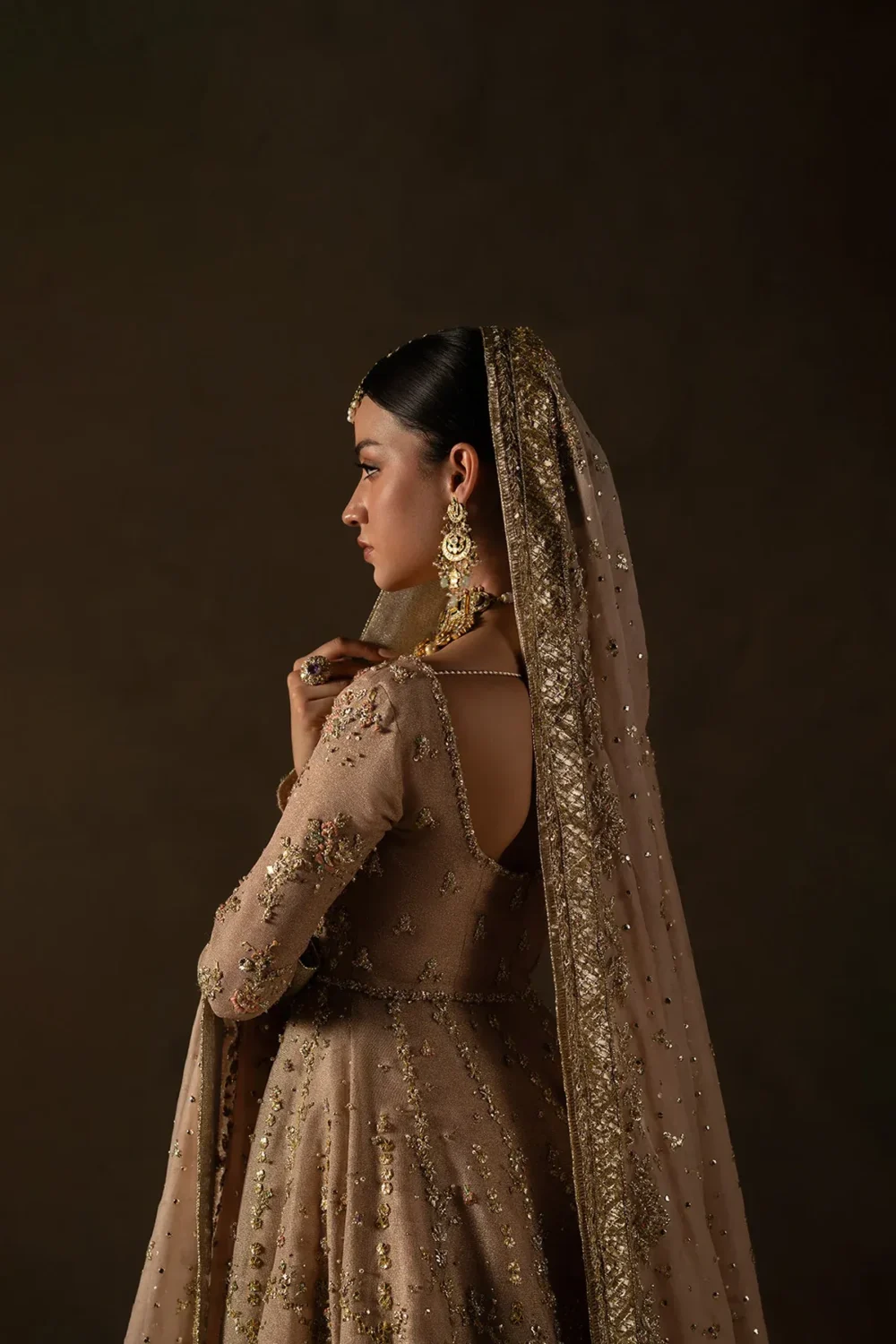 dusty-fawn-bridal-anarkali-zari-net-peshwas-tissue-lehenga-front-view-hammad-bespoke-official.webp dusty fawn bridal anarkali zardozi mokaish nikkah dress back view Hammad Bespoke Official
