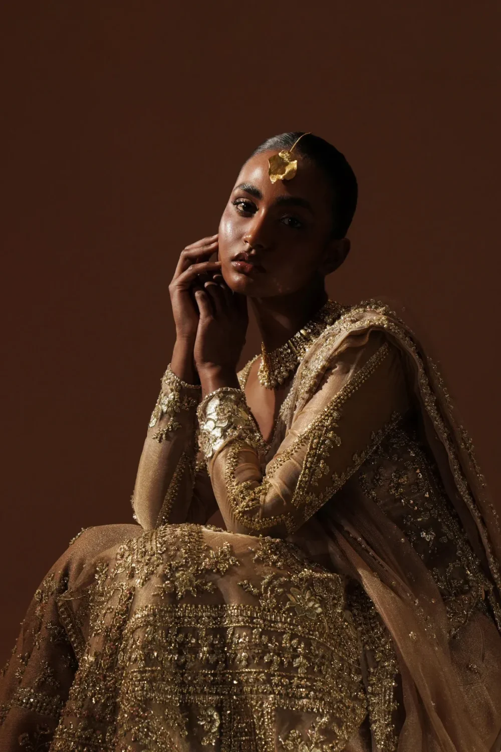 bridal-sharara-gold-tissue-zardozi-sequin-pearl-embellishment-bodice-detail-hammad-bespoke-official.webp bridal sharara gold tissue Zardozi sequin pearl embellishment bodice detail Hammad Bespoke Official