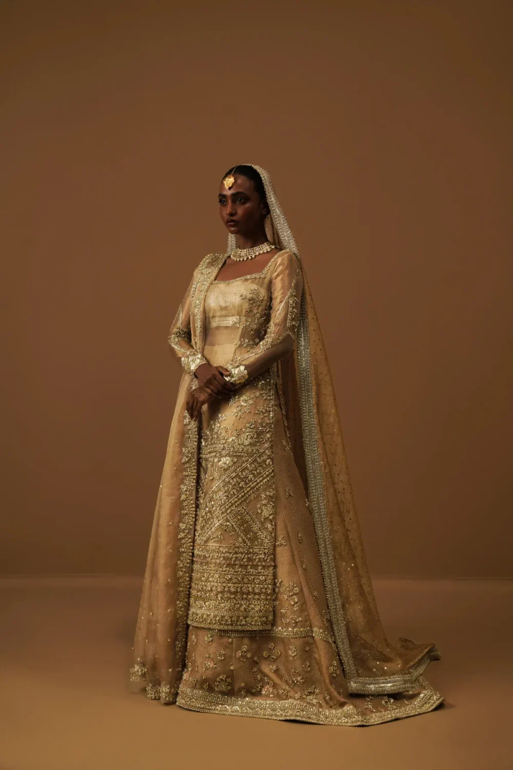 bridal-sharara-gold-tissue-peshwas-kundan-net-farshi-zari-net-dupatta-master-artisan-hammad-bespoke-official.webp bridal sharara gold tissue peshwas Kundan Net farshi zari net dupatta Master Artisan Hammad Bespoke Official