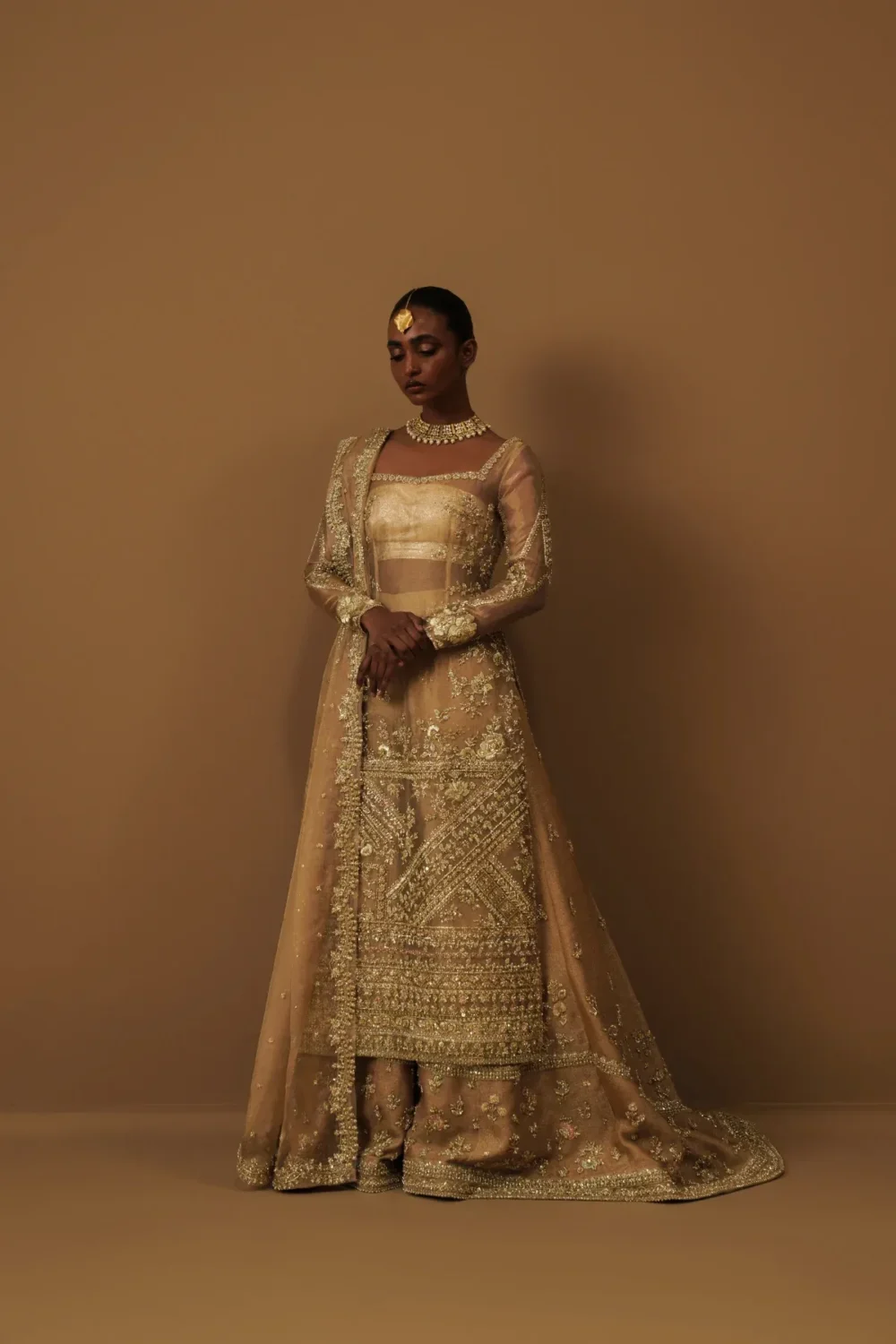 bridal-sharara-antique-gold-four-piece-tissue-kundan-net-set-full-length-hammad-bespoke-official.webp bridal sharara antique gold four-piece tissue Kundan Net set full-length Hammad Bespoke Official
