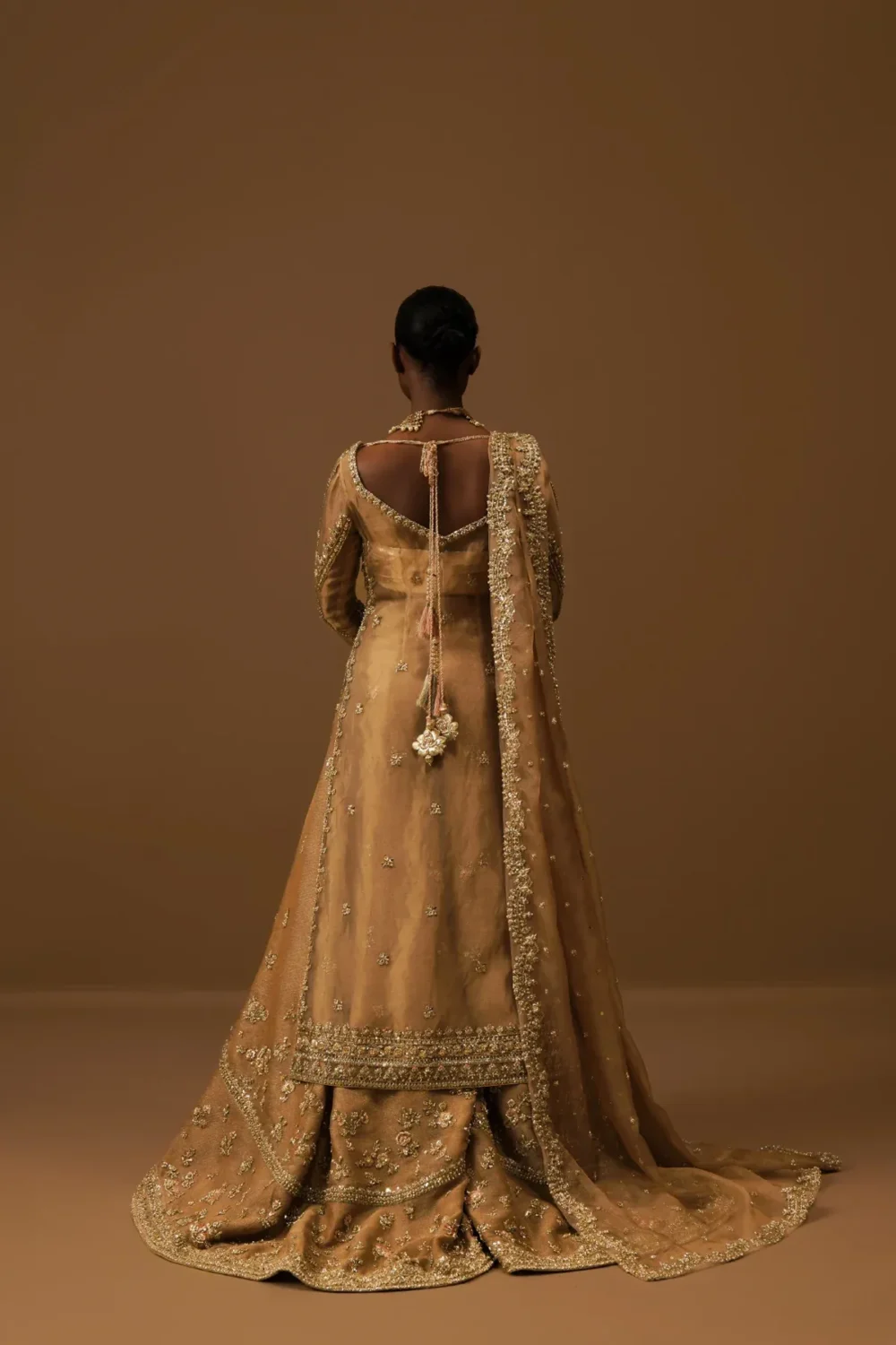 bridal-sharara-antique-gold-tissue-open-back-peshwas-tassel-tie-farshi-skirt-hammad-bespoke-official.webp bridal sharara antique gold tissue open-back peshwas tassel tie farshi skirt Hammad Bespoke Official