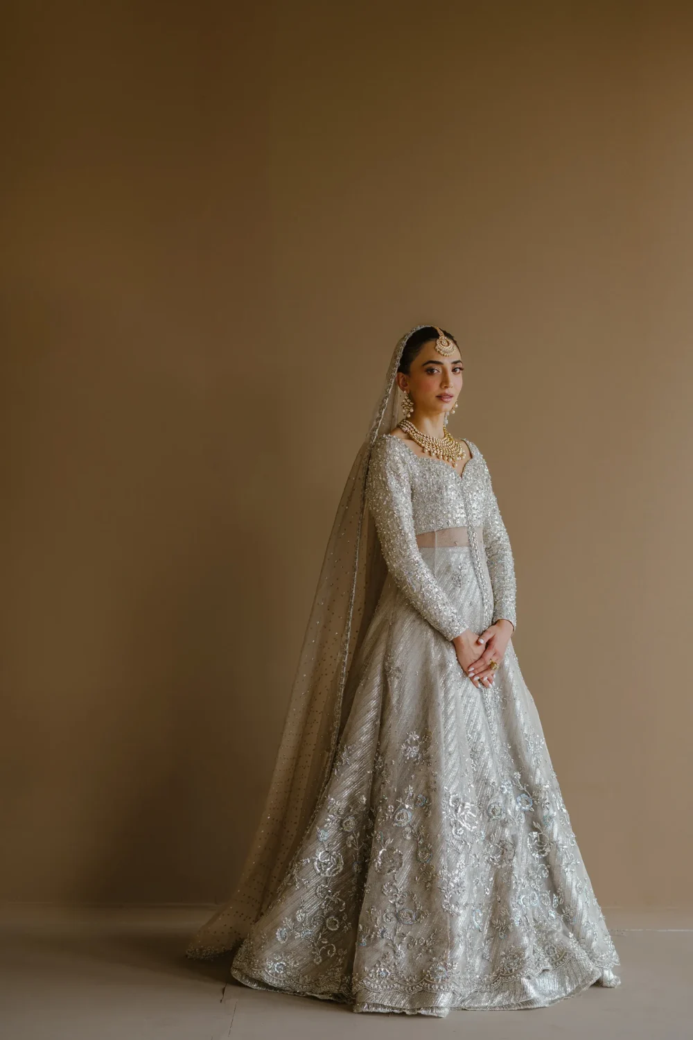 white-bridal-lehenga-silver-peshwas-brocade-lehenga-zari-net-nikkah-bespoke-hammad-bespoke-official.webp white bridal lehenga silver peshwas brocade lehenga zari net nikkah bespoke Hammad Bespoke Official
