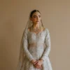 white-bridal-lehenga-ivory-silver-peshwas-zari-net-brocade-nikkah-full-length-hammad-bespoke-official.webp white bridal lehenga ivory silver peshwas zari net brocade nikkah full length Hammad Bespoke Official