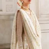 Sitara Mukaish hand-embellishment ivory net bodice Pakistani formal suit Hammad Bespoke Official