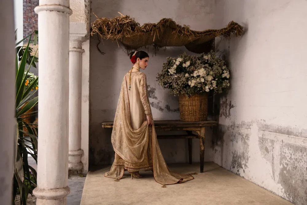 Full back view showing mukaish dupatta drape on gold organza angrakha suit - Hammad Bespoke Official