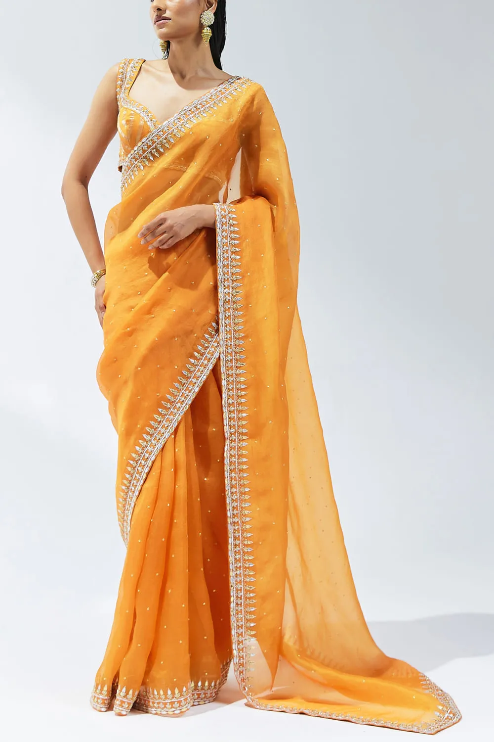 orange-saree-silk-organza-gota-patti-drape-side-hammad-bespoke-official-multan-atelier.webp orange saree silk organza gota patti drape side Hammad Bespoke Official Multan atelier