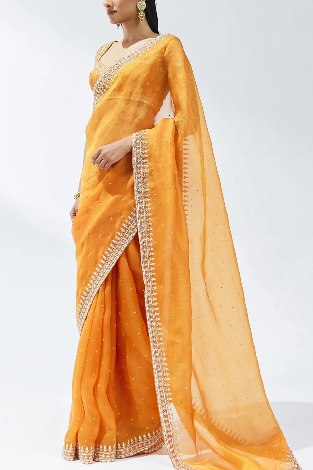 orange-saree-pallu-drape-back-silk-organza-zardozi-border-hammad-bespoke-official.webp orange saree pallu drape back silk organza zardozi border Hammad Bespoke Official
