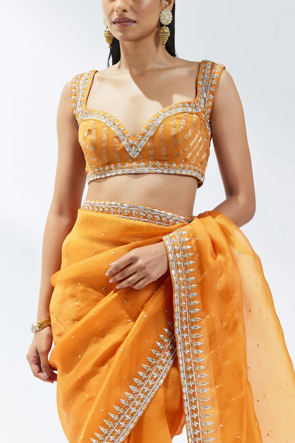 open-back-tie-string-blouse-orange-saree-zardozi-gota-patti-hammad-bespoke-official.webp open-back tie-string blouse orange saree zardozi gota patti Hammad Bespoke Official