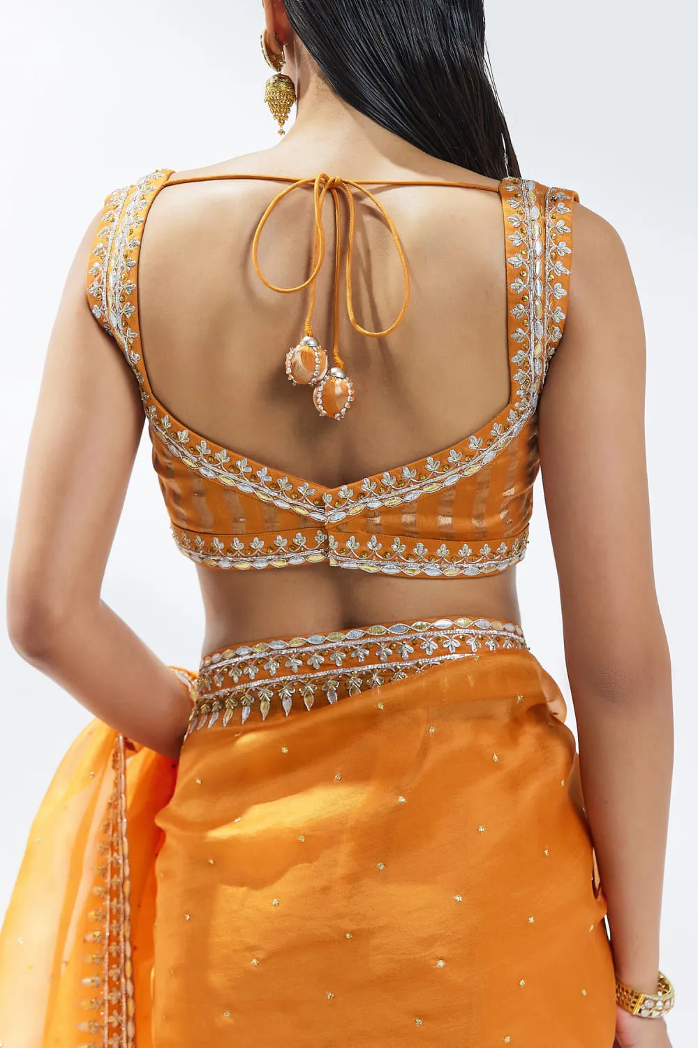 zardozi-gota-patti-border-detail-orange-saree-silk-organza-hammad-bespoke-official.webp zardozi gota patti border detail orange saree silk organza Hammad Bespoke Official