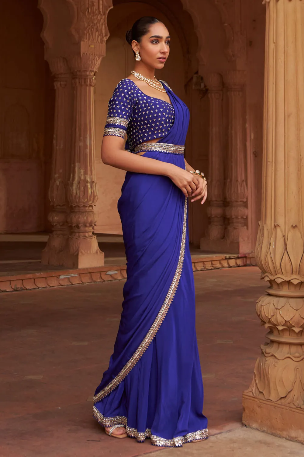 side-drape-blue-saree-hammad-bespoke-official-hand-embroidered-sequin-crepe-master-artisan.webp side-drape blue saree Hammad Bespoke Official hand-embroidered sequin crepe Master Artisan