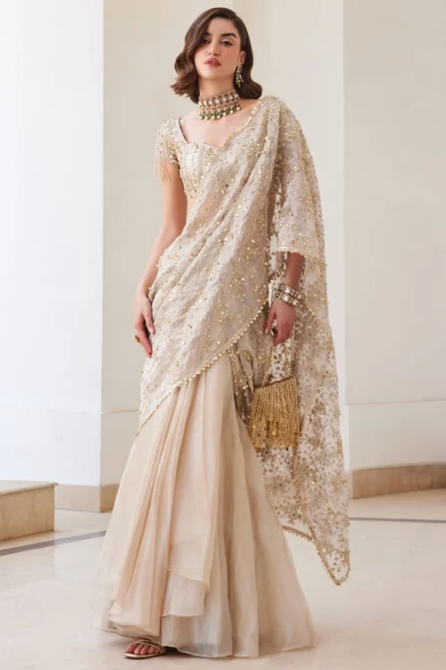 pre-draped-saree-champagne-mokaish-sequin-master-artisan-multan-atelier-hammad-bespoke-official.webp pre draped saree champagne Mokaish sequin Master Artisan Multan atelier Hammad Bespoke Official
