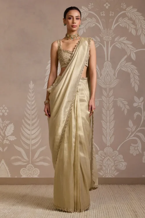 champagne-gold-tissue-saree-pallu-drape-pre-stitched-saree-hammad-bespoke-official-atelier.webp champagne gold tissue saree pallu drape pre stitched saree Hammad Bespoke Official atelier (90c)